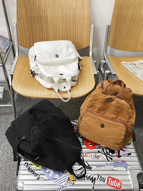 Mochila de bolsos de hombro sólidos de lona estilo japonés