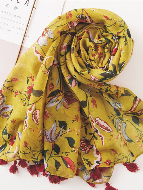 Bufanda protectora solar con estampado floral amarillo primaveral